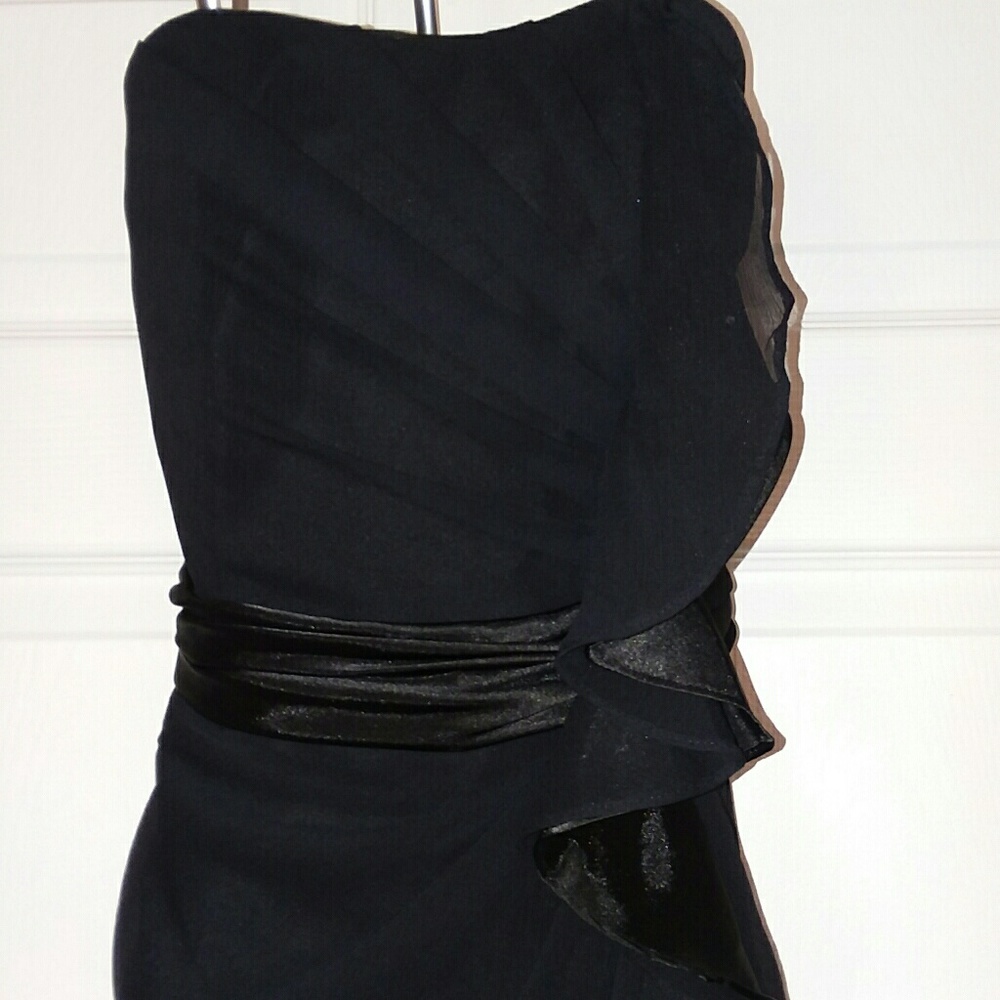 Long strapless deep navy dress with ruffle cascade